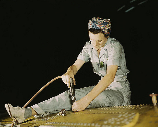a women wears pants while working during the 1940s