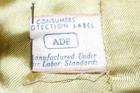 a union label with consumer protection label and manfactured under labor standards 